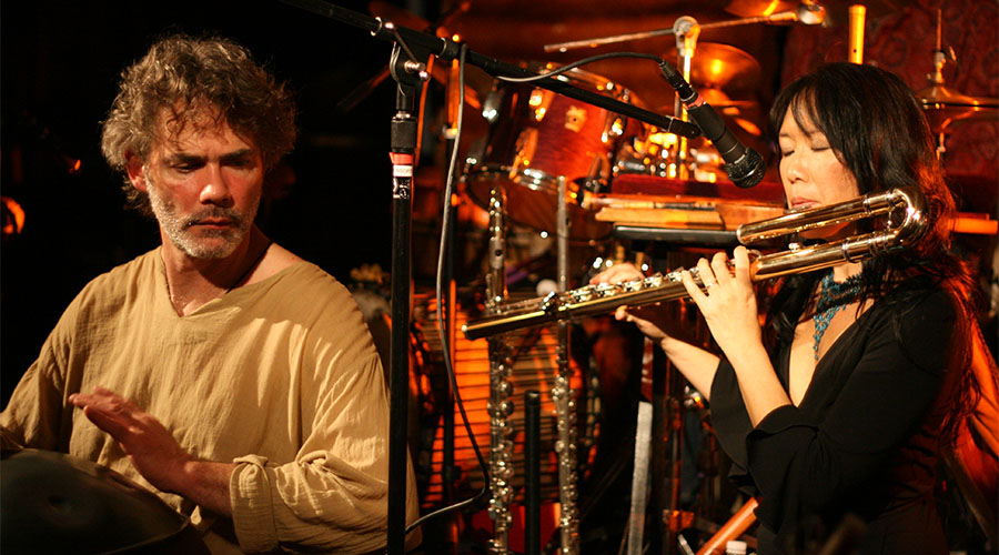 Side-by-side image of performers playing the drums and flute
