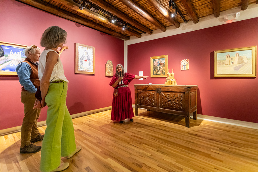 patrons viewing artwork at the Harwood Museum